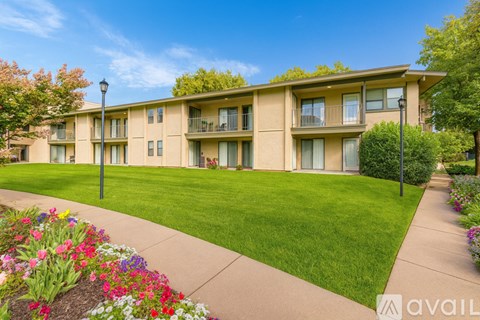 A building with a lawn in front of it.