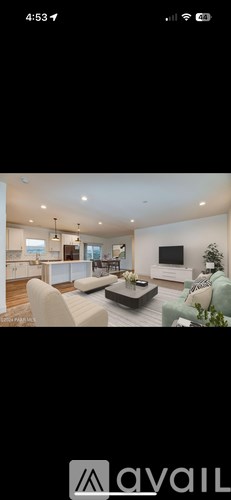 A modern living room with a large sofa and a coffee table.