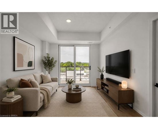 A modern living room with a large window and a flat screen TV.