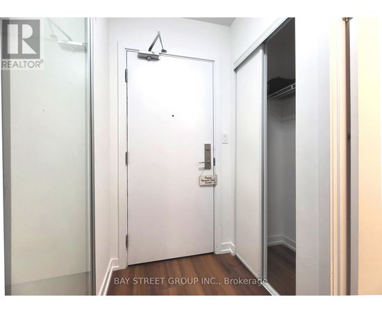 A white door with a glass window above it.