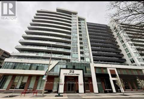 A tall building with the number 212 on it.