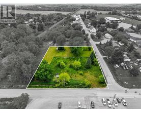 An aerial view of a parking lot with a REMAX sign.