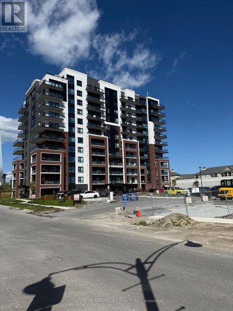 A large building under construction with a clear blue sky in the background.