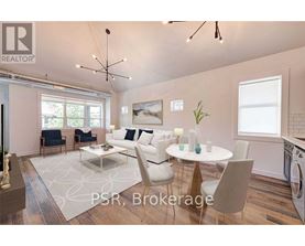 A modern living room with a dining table set up with white chairs.