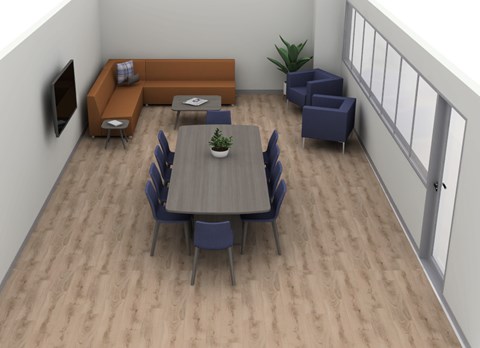 A dining room with a table surrounded by chairs and a couch.