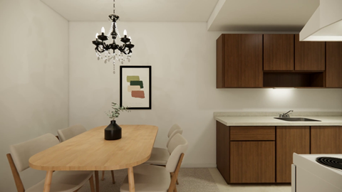 A dining room with a wooden table and chairs.