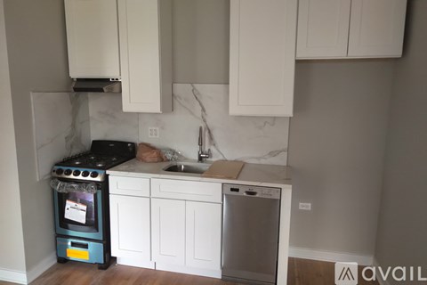 A kitchen with a stove and a dishwasher.