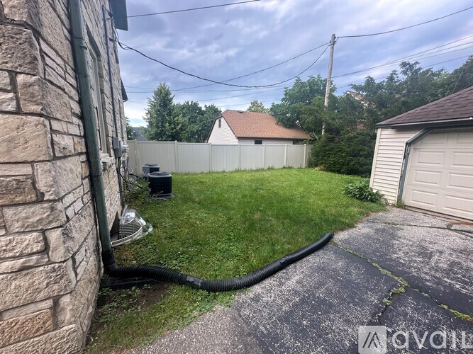 A house with a driveway and a garage.