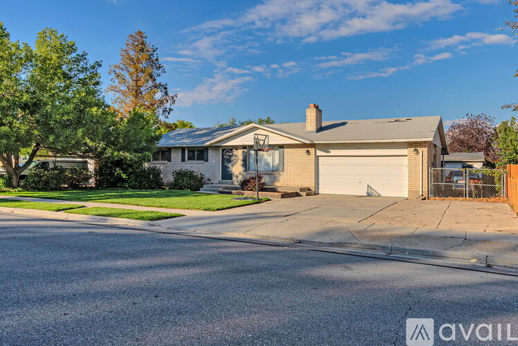 A house with a garage is available for sale.