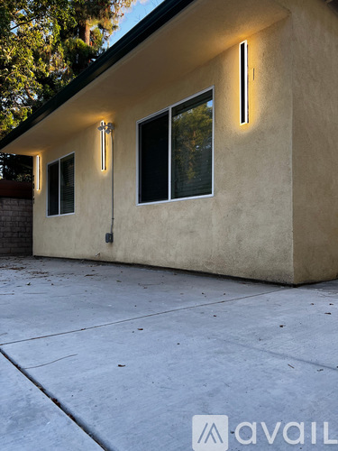 A house with a concrete wall and a concrete floor.