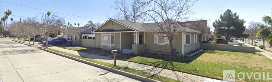 A house with a driveway in front of it.