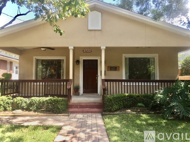 A house with the number 3722 on the front door.