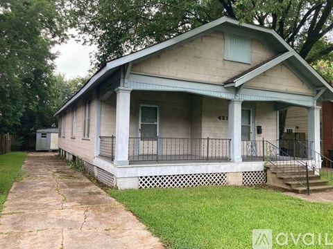 A house with the number 421 on it.