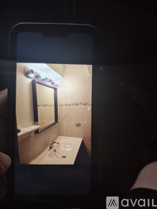 A bathroom is shown on a phone screen.