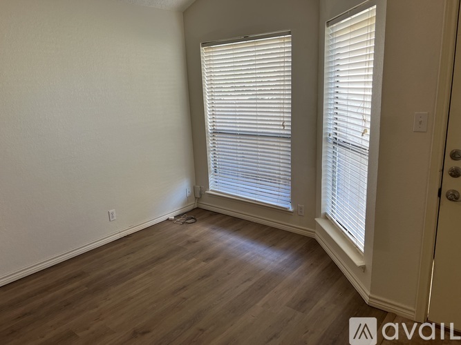 A bathroom with a walk-in shower and a toilet.