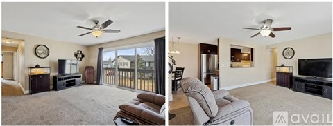 A living room with a brown leather couch and a ceiling fan.