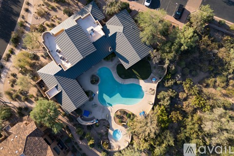 A house with a pool in the backyard.