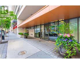 A street view of a building with a sign that reads "Landlord Realty Inc Brokerage".