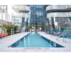A pool with the words shallow area written on it.