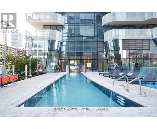 A pool with the words shallow area written on it.