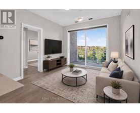 A living room with a flat screen TV and sliding glass doors.