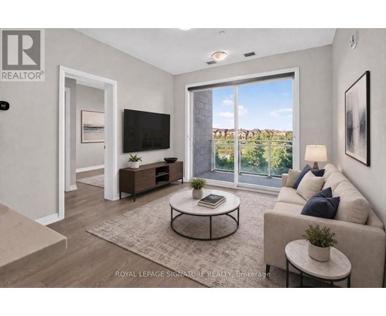 A living room with a flat screen TV and sliding glass doors.