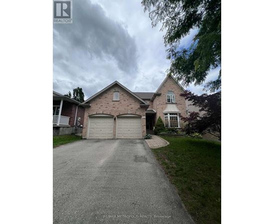 A house with a driveway in front of it.
