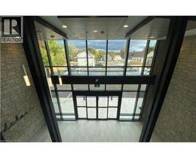 A view from the top of a building looking down at a balcony.