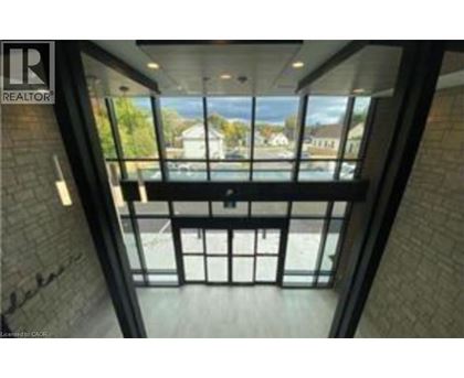 A view from the top of a building looking down at a balcony.