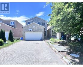 A house with a garage is for sale.
