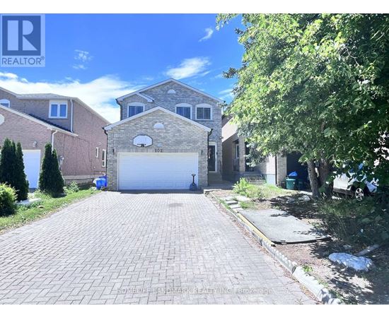 A house with a garage is for sale.