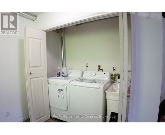 A small bathroom with a toilet and sink.