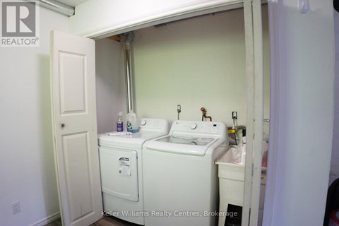 A small bathroom with a toilet and sink.