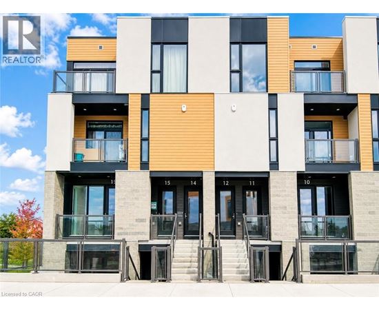 A modern building with a balcony and a glass door.
