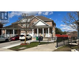 A house with a sign that says "Central 2 Paramount Realty Inc Brokerage".