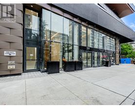 The image shows the front of a building with the sign "RE/MAX COMMUNITY REALTY INC." on the left side.