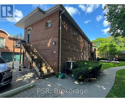 A brick building with the words PSR Brokerage on the bottom.