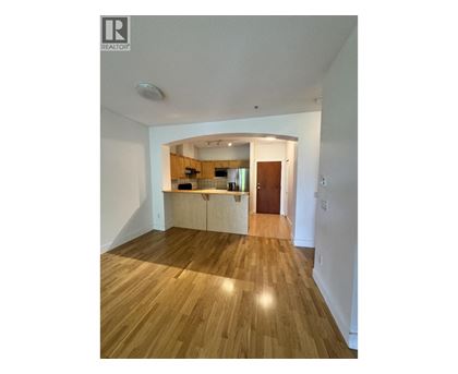 A room with wooden floors and a white ceiling.