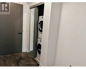 A Royal LePage Signature Realty Brokerage logo is on a door.