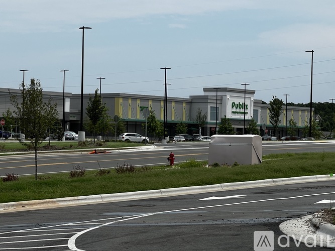 A Publix store is visible from the street.