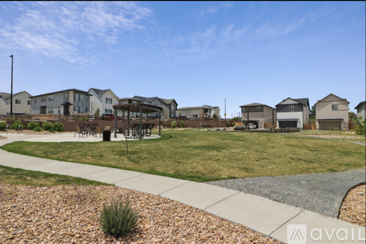 A housing development with houses and a playground.