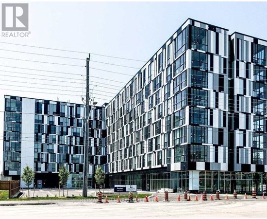 A modern building with a glass facade is shown in the image.