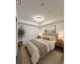 A bedroom with a large bed and a painting on the wall.