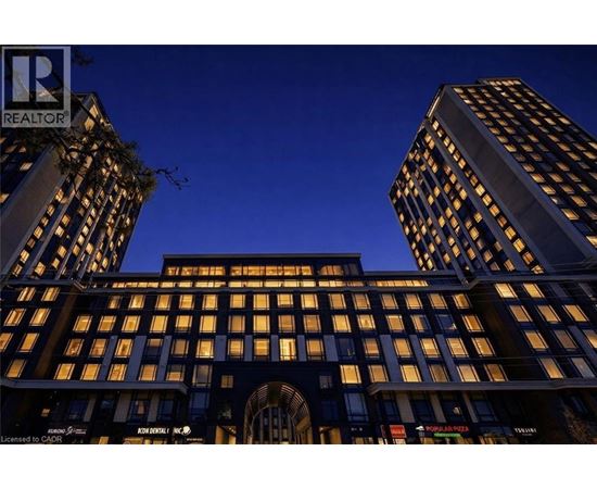 A tall building with a sign that says "REALTOR" on it.