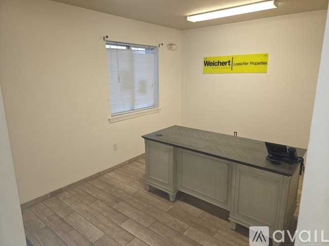 A room with a Weichert logo on the wall.
