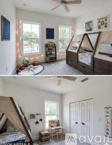 A bedroom with a bed and a table in it.