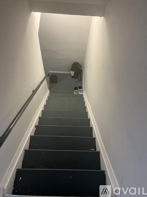 A staircase with a light at the top.