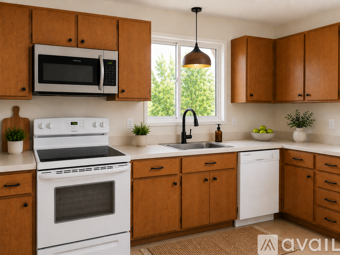 A kitchen with wooden cabinets and white appliances.