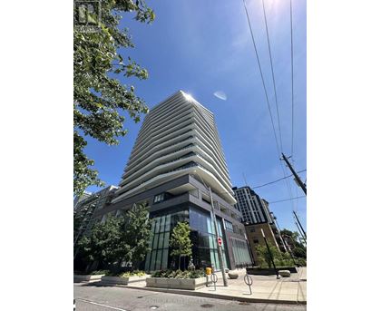 Spectrum Realty Service is written on the building.