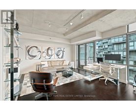 A modern office space with a large window overlooking the city.